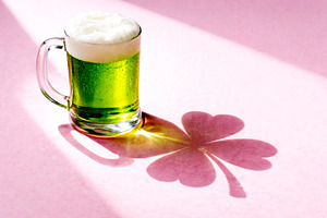 a shamrock shadow from green beer, generative AI, a Photo by Nito