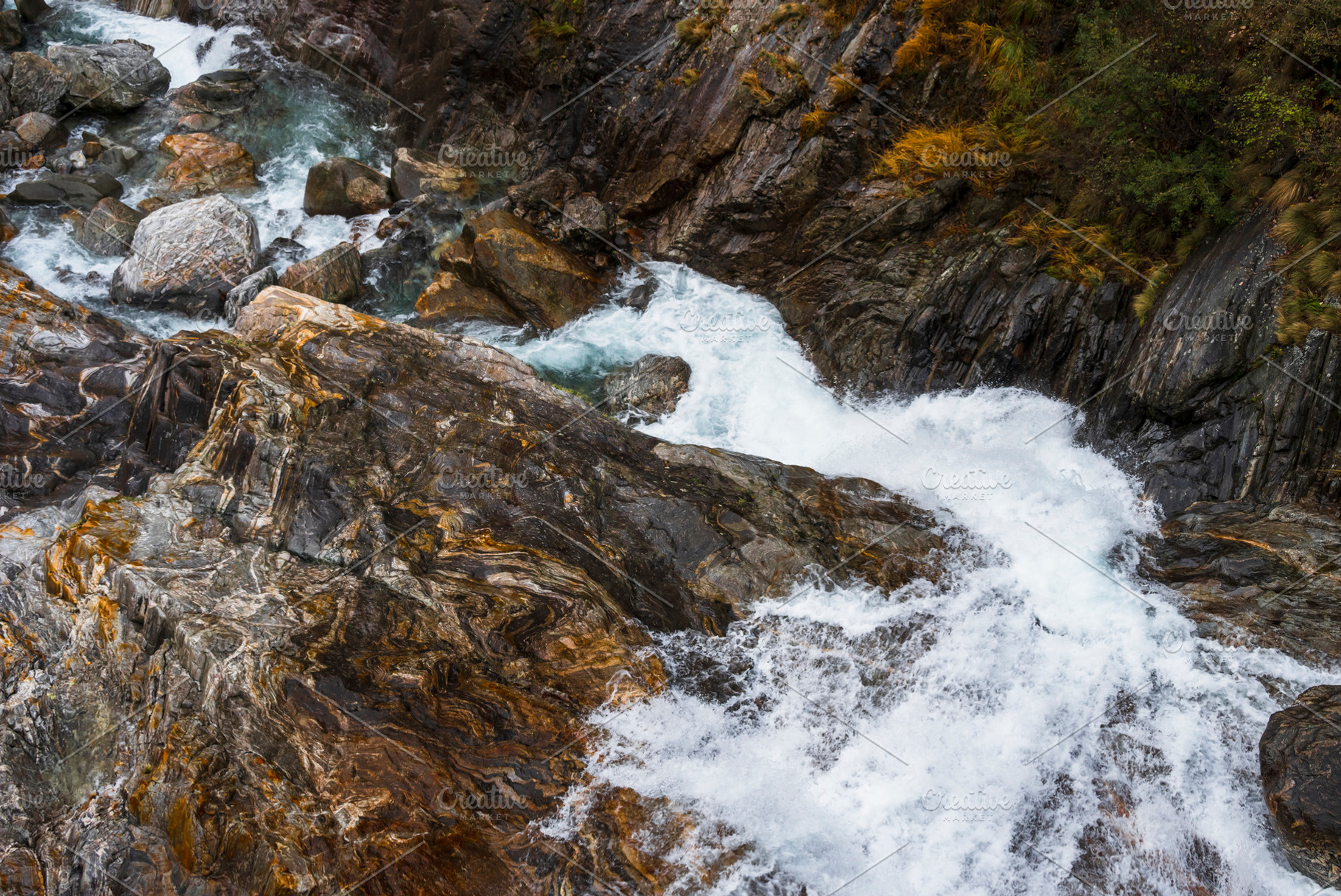 Waterfall on rock mountain, a Background Photo by Simmi Simons