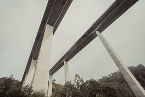 Concrete viaduct in misty air, an Architecture Photo by SkyNext