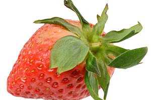 Ripe red strawberry berry with green sepals and leaves, a Food & Drink Photo by ndanko