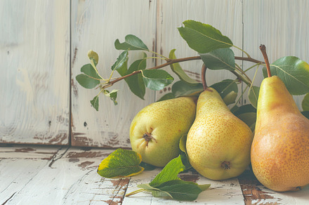 Red pears with green leafs on wooden table, a Food & Drink Photo by AlyaAnd