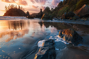 Sunset at the beach featuring sunset, sunrise, and sky