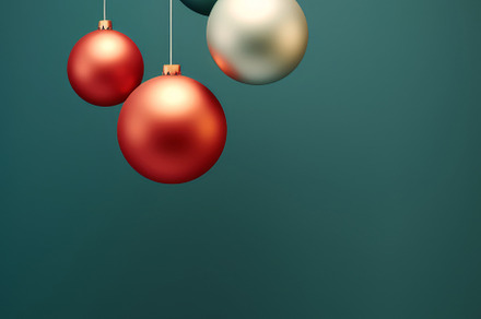 Christmas red and green matte ornaments on teal green background, a Photo by Dvoevnore photos