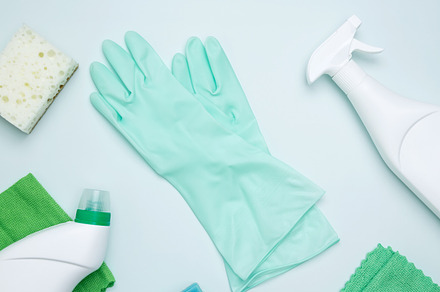 Concept of cleanliness and hygiene. Cleaning supplies and tools, including bott, a Photo by matucha