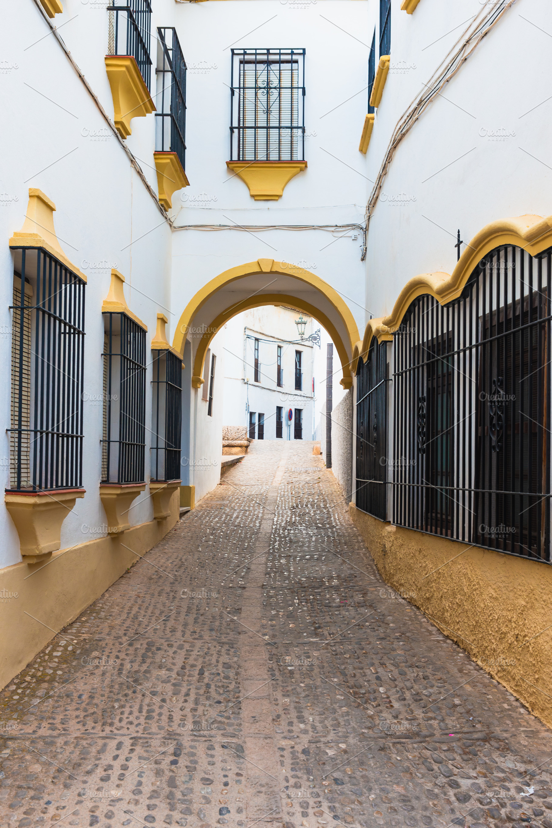 Typical street in the city of Ronda, a Holiday Photo by Fotoeventis