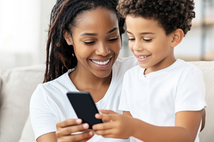 Mother and child enjoying quality ti, a Photo by Dvoevnore photos