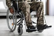 Legs of disabled african american military man in wheelchair, a Photo by Prostock-Studio (Thumbnail 1 of 2)