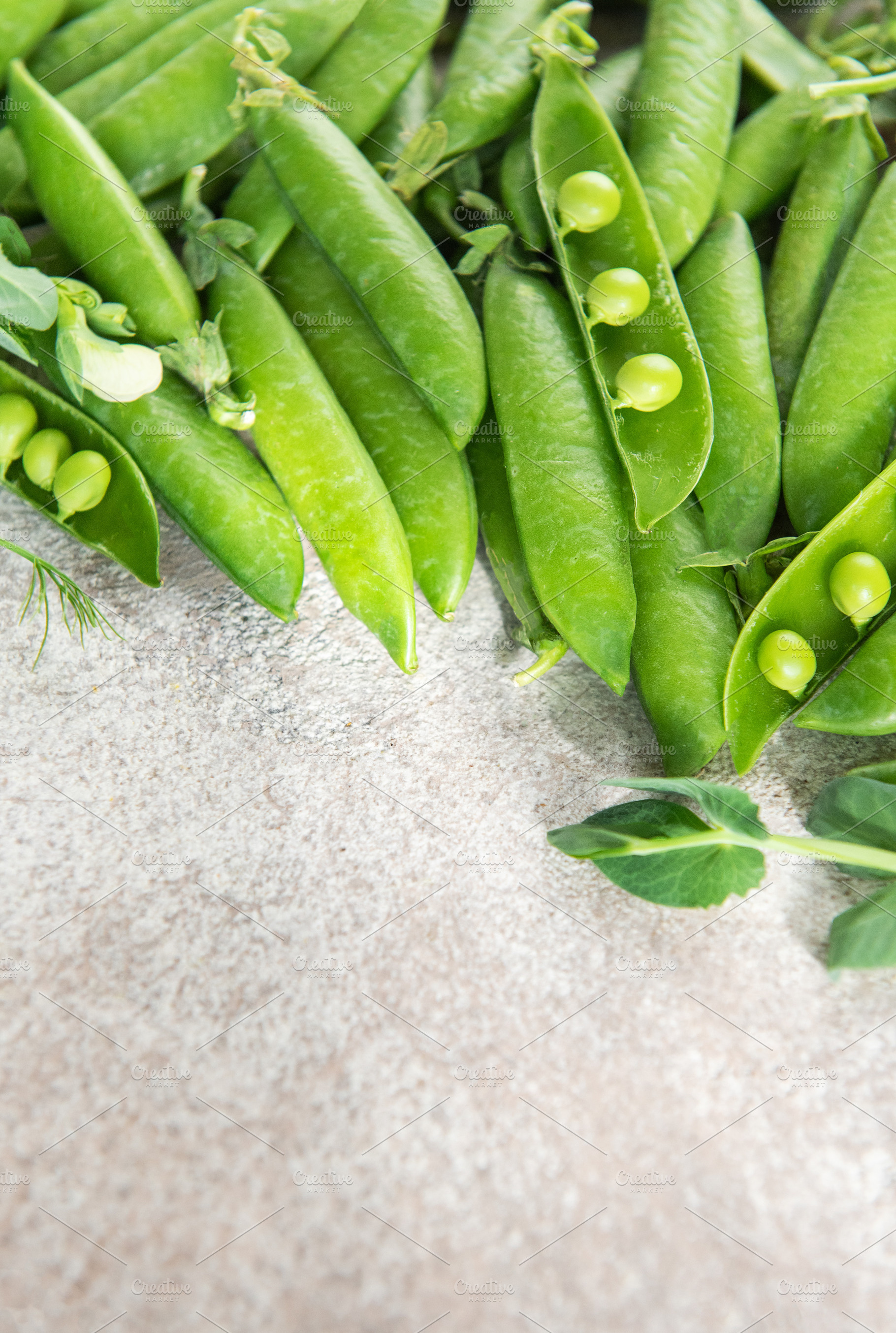 Fresh green peas arriving from organic harvest, a Food & Drink Photo by Olena Rudo