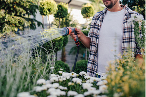 Close up of garden center worker, a Nature Photo by HalfPoint