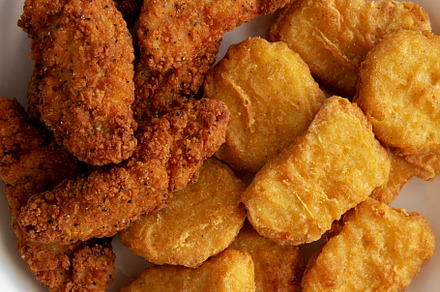 Homemade Chicken Strips and Nuggets with Ketchup, a Food & Drink Photo by LiudmylaChuhunova