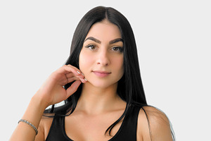 Wellness portrait female model touching hair skin, a Person Photo by Photo Drive Studio
