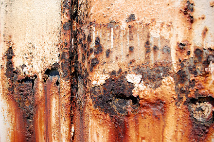 Badly rusted corrugated iron wall