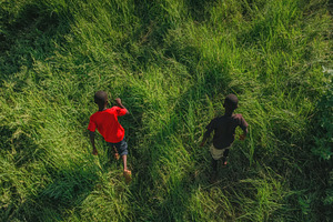 Boys joyfully playing and running th, a Photo by Iftikhar Alam