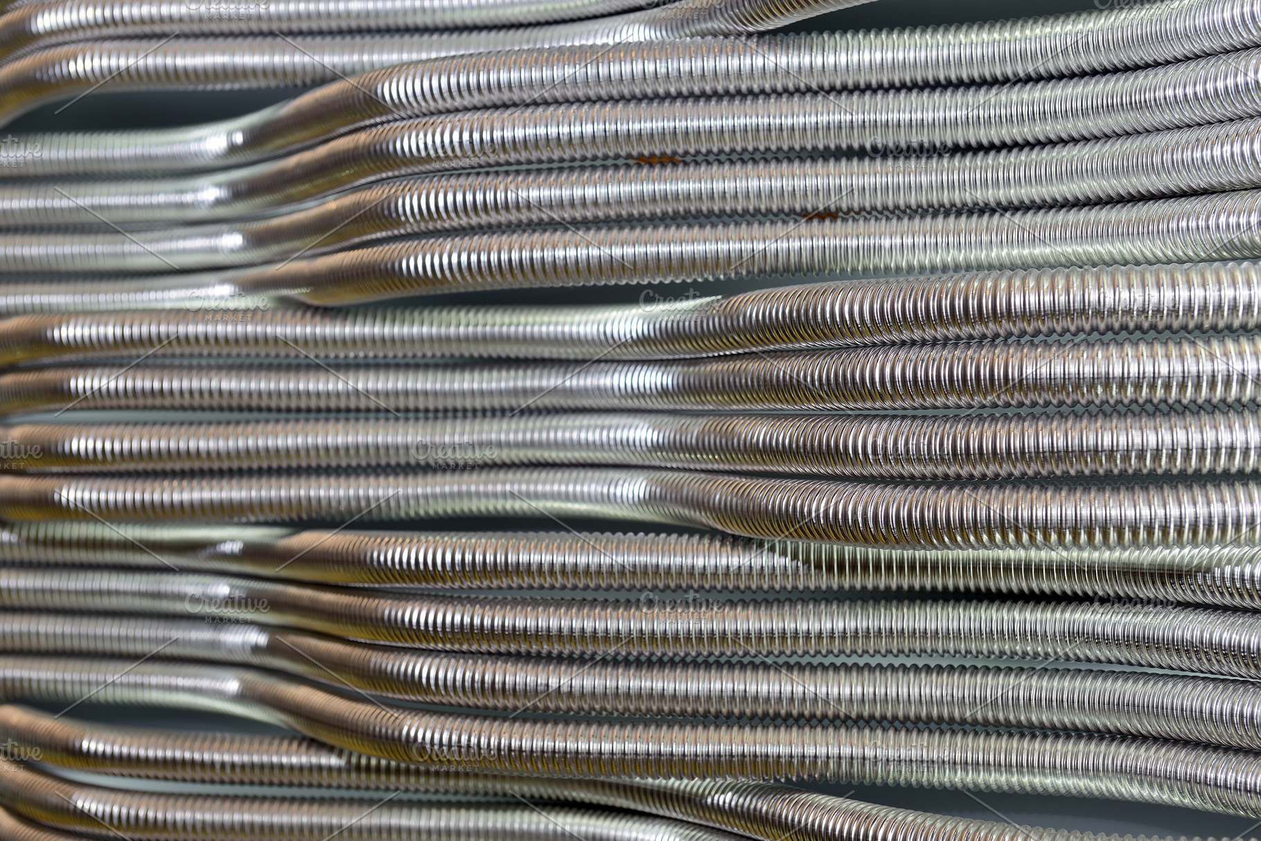 Corrugated stainless metal tubes featuring corrugated, metal, and tube, an Abstract Photo by FedotovAnatoly