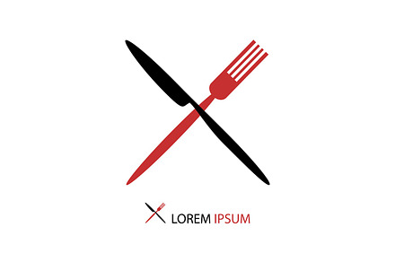 Crossed black and red flatware