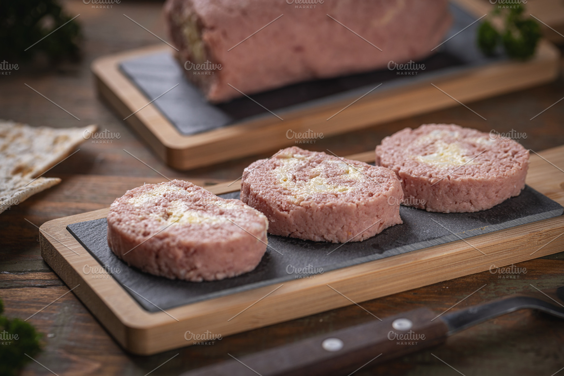 Slices of savory meatloaf with egg filling, a Photo by Grafvision photography