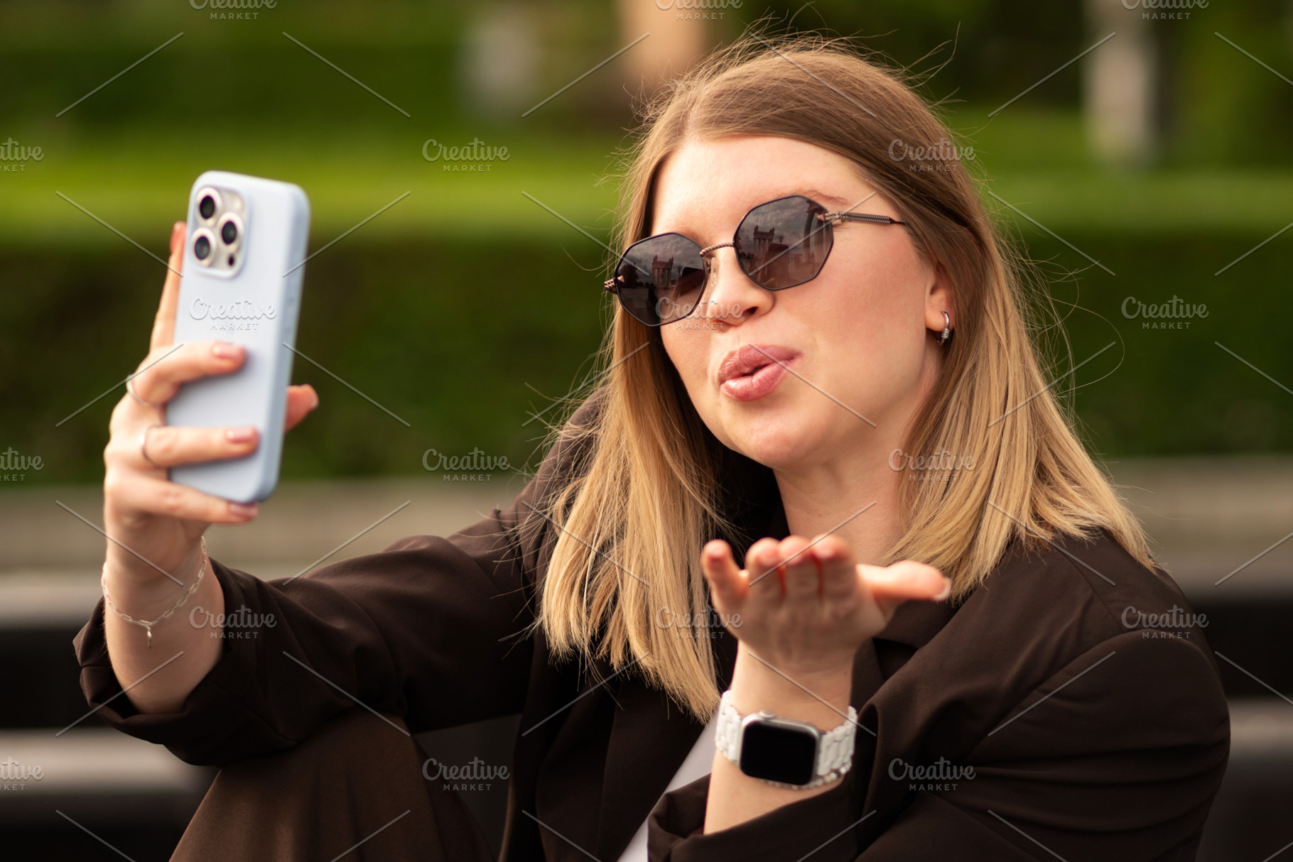 Young woman wearing sunglasses, a Person Photo by Elena Vagengeim