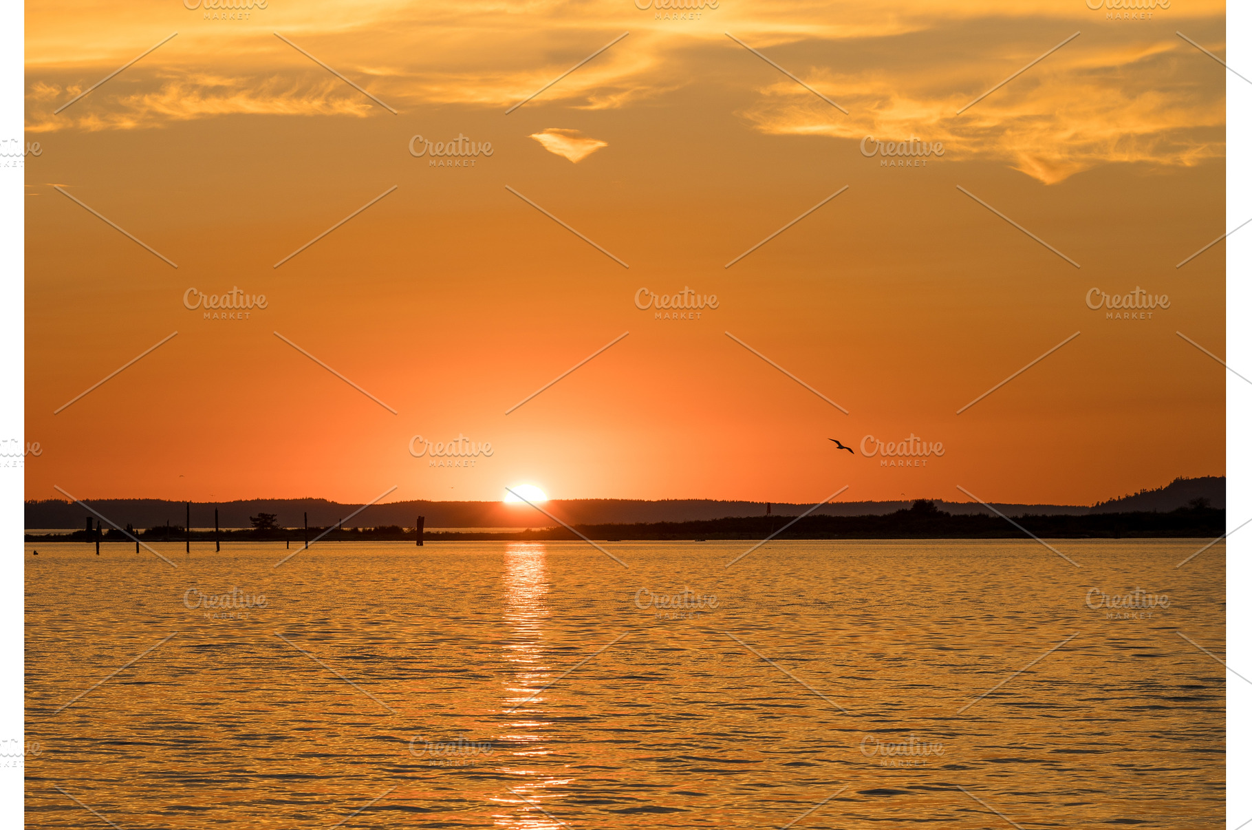 Dramatic sunset clouds over, a Nature Photo by Backyard Stock