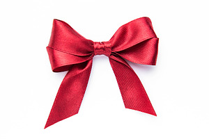 Red satin ribbon bow decorating present gift, a Holiday Photo by Olena Rudo