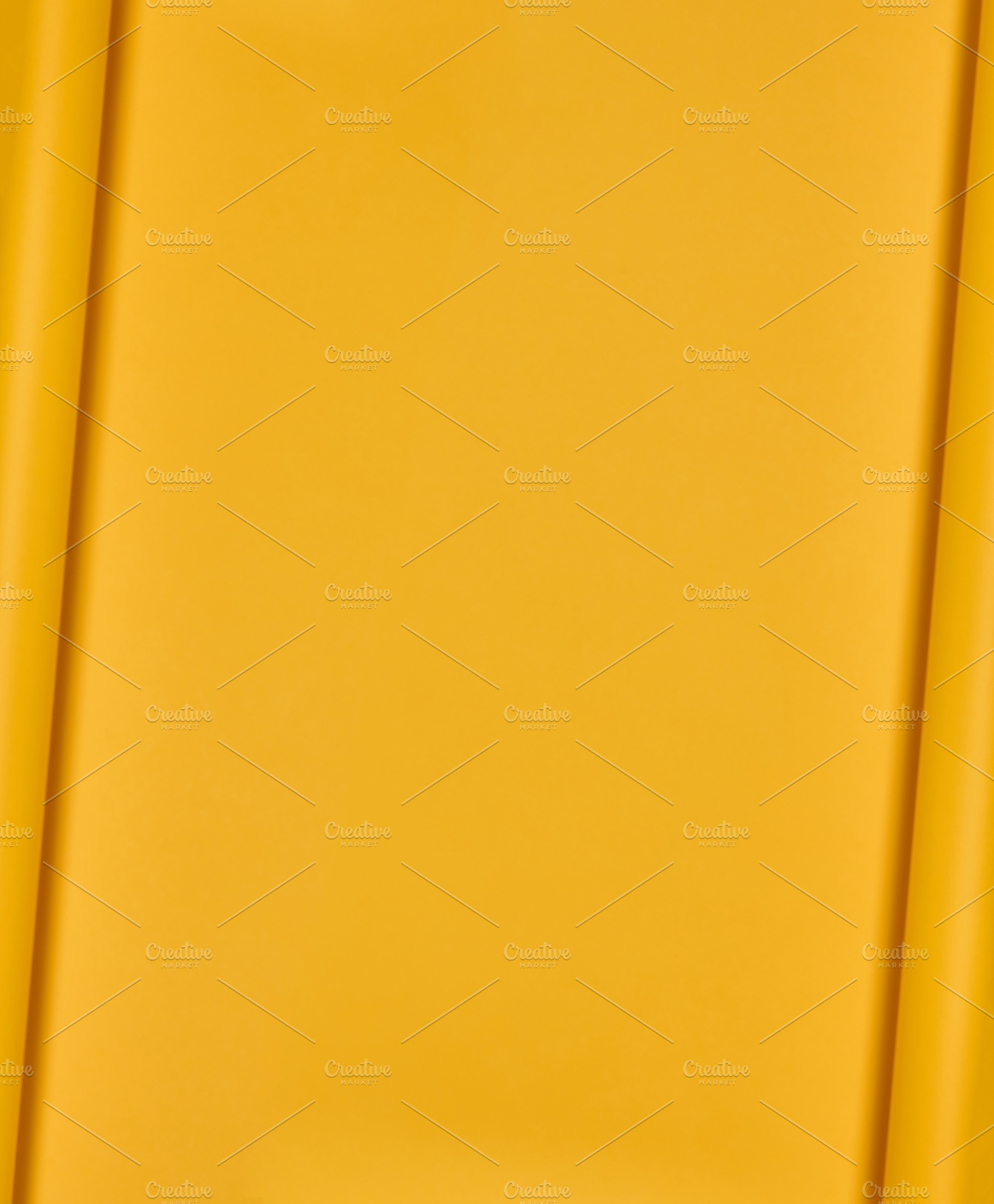 Yellow paper background with curled edges, vertical layout, a Background Photo by ndanko
