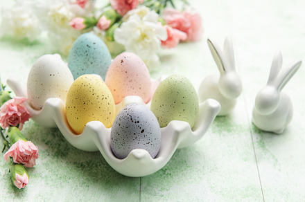 Easter decor. Colored Easter eggs on a ceramic stand and decorat, a Holiday Photo by Olena Rudo