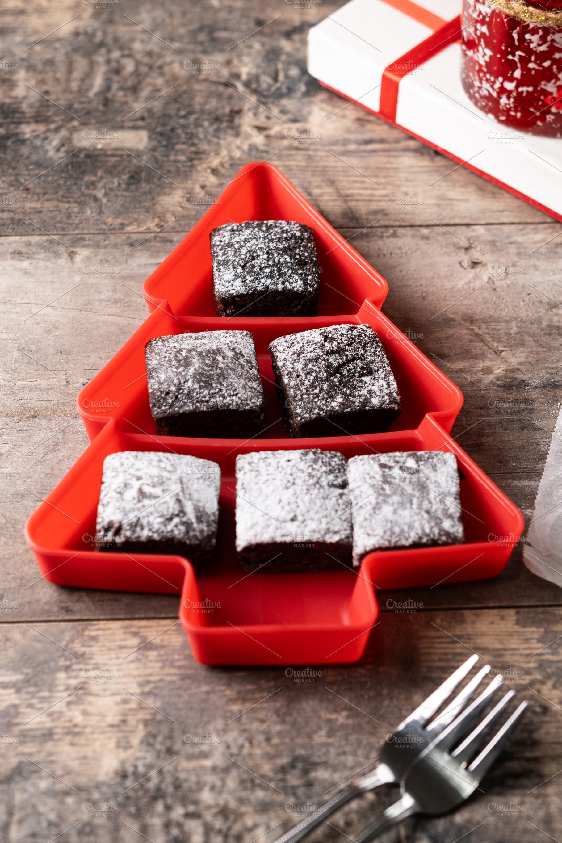 Chocolate brownies with powdered sugar in Christmas tree tray, a Food & Drink Photo by etorres69