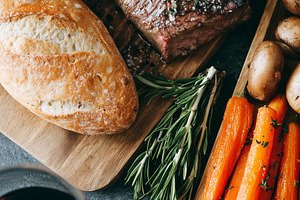 Juicy grilled steak served with, a Food & Drink Photo by MistyDay