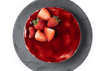 Cheesecake with strawberries isolated on white background, a Food & Drink Photo by etorres69