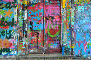 Old doorway covered in graffiti