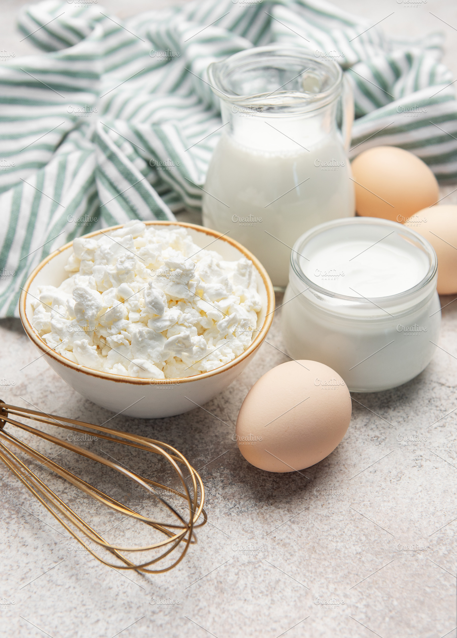 Dairy products and eggs for healthy breakfast and baking, a Food & Drink Photo by Olena Rudo