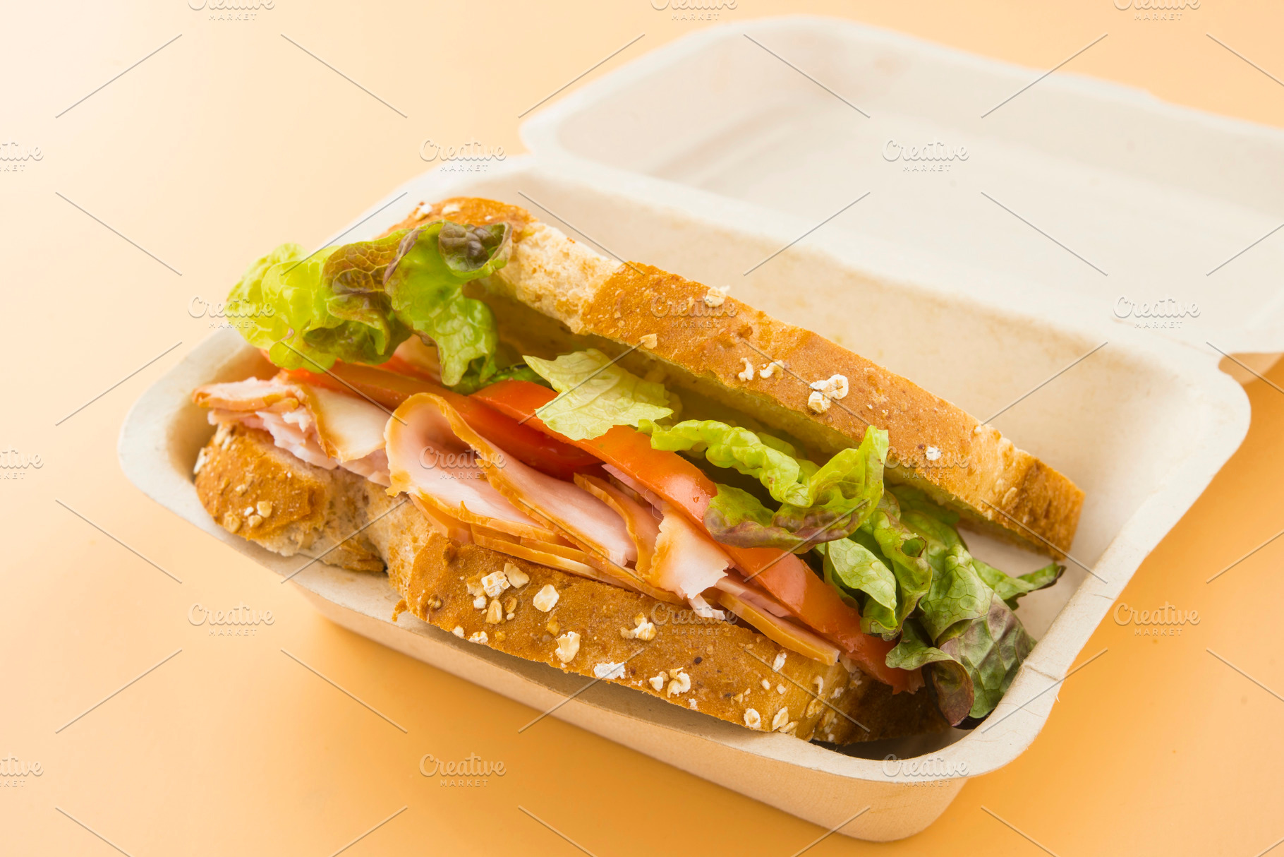 Sandwich of tomato lettuce and smok featuring bread, close up, and food, a Food & Drink Photo by DalaiFood
