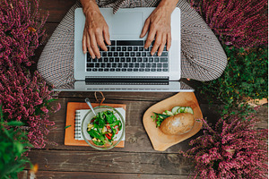 Top view of woman having lunch while, a Person Photo by HalfPoint