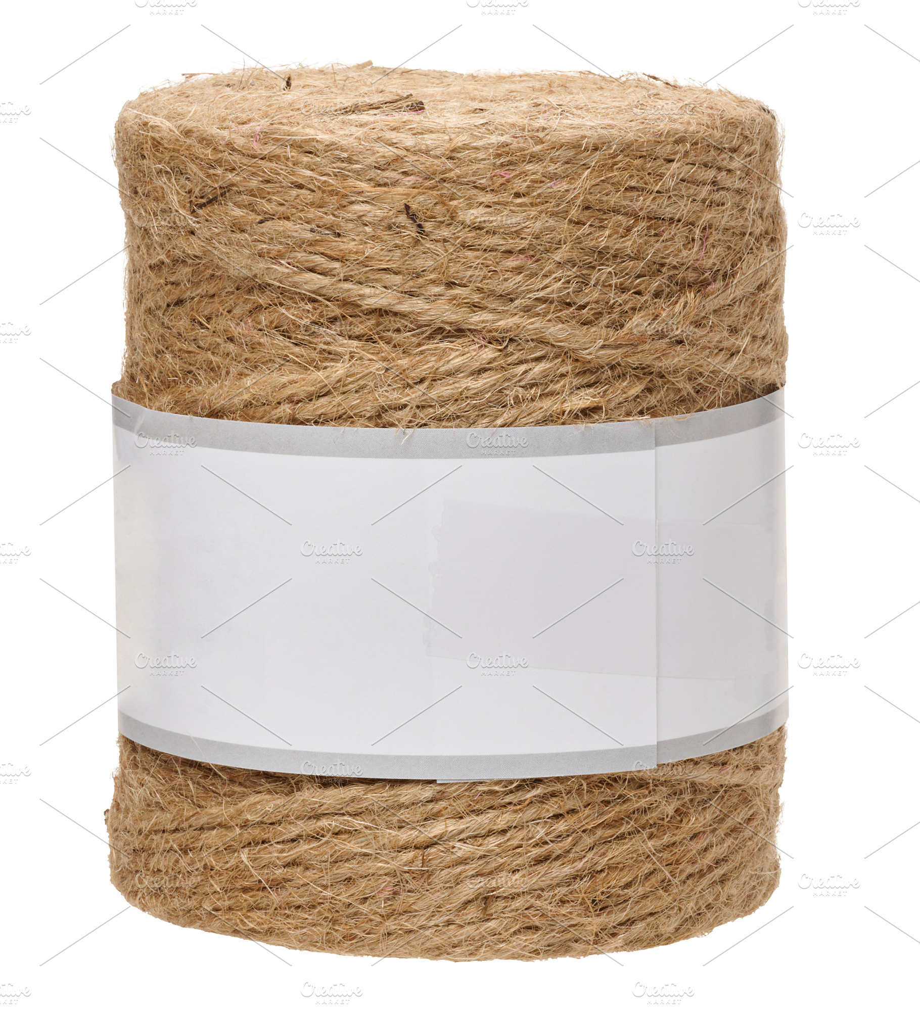 Roll of natural jute rope for packaging with white blank paper l, an Industrial Photo by ndanko