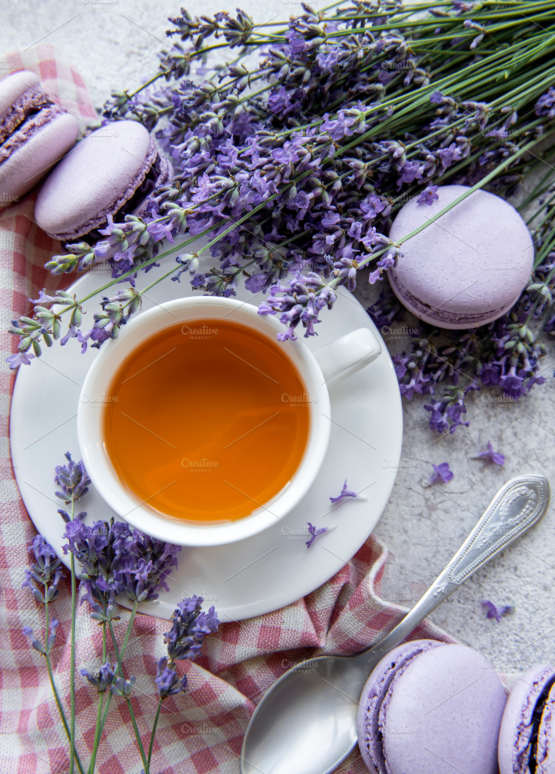Cup of tea with macaroon dessert with lavender flavor, a Food & Drink Photo by Olena Rudo