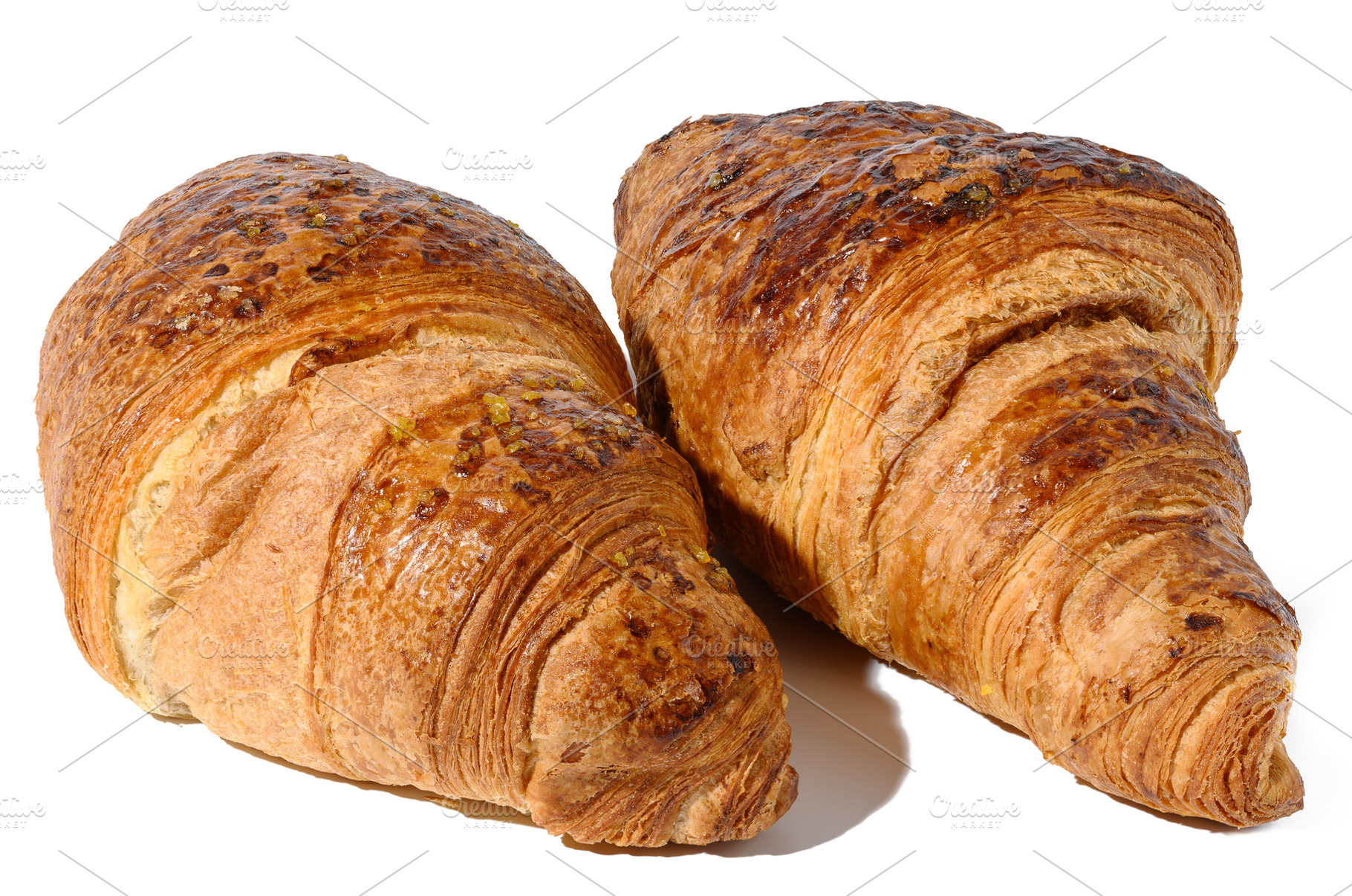 Baked croissant on a white isolated background, top view, a Food & Drink Photo by ndanko