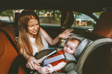Mother and baby in car child sitting, a Transportation Photo by e v e r s t