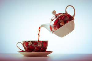 Teapot with cup full of tea, a Food & Drink Photo by MadPhotos
