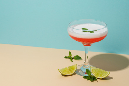 Concept of delicious alcohol drink, Cosmopolitan cocktail, a Food & Drink Photo by AtlasStudio PRO