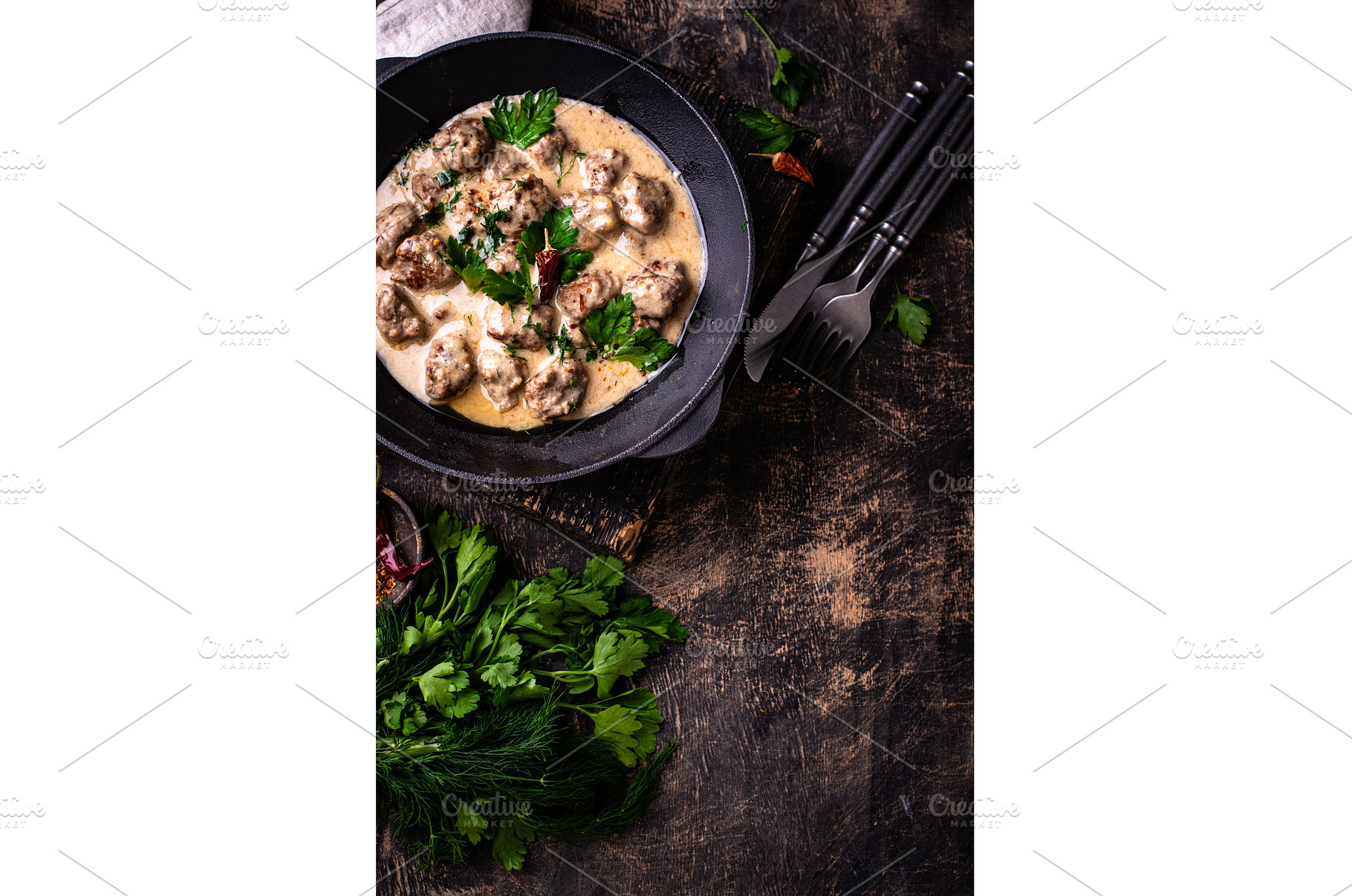 Meatballs in sour cream sauce in a, a Food & Drink Photo by Yulia Furman