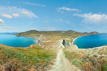Summer rocky coastline and camping on sandy beach (Tihaja Bay (K, a Nature Photo by YuriyB