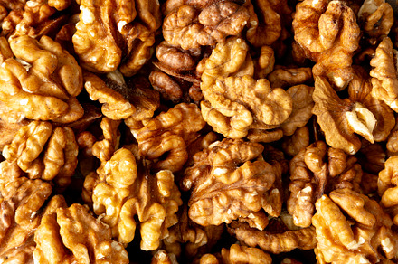 Raw Walnut Halfs, top view. Flat lay, overhead.