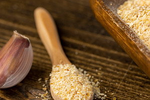 dried garlic fruits for cooking, dried spices from very small pieces of garlic, a Photo by rsoollAI