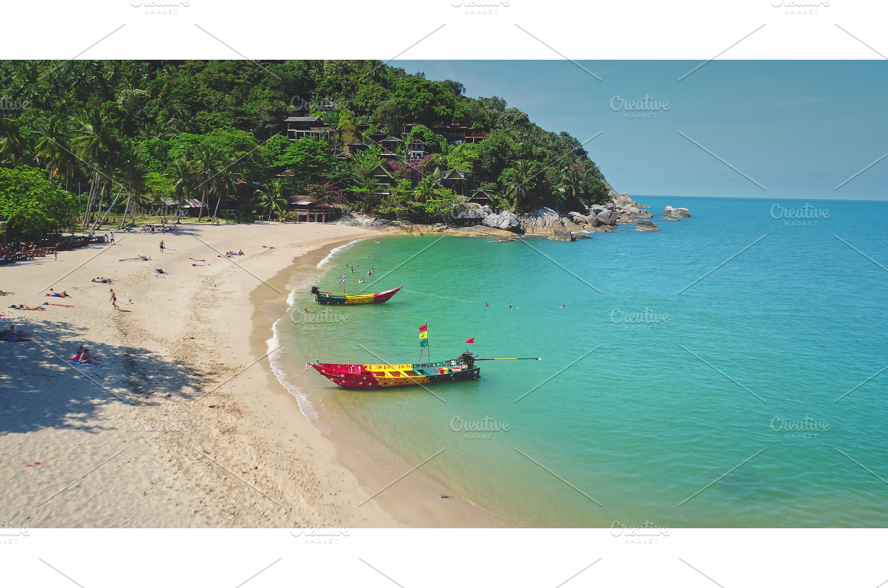 Tropical beach with colorful boats, a Nature Photo by Goinyk