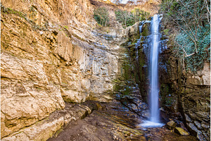 Waterfall in botanical gardens of tbilisi featuring forest, stream, and, a Nature Photo by Leonid Andronov