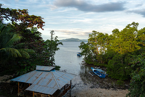 Small cove on Bunaken Island Sulawesi Indonesia under soft eveni, a Nature Photo by GoodGoods