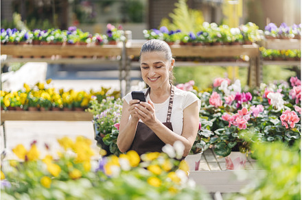 Middle Age Woman Using Phone