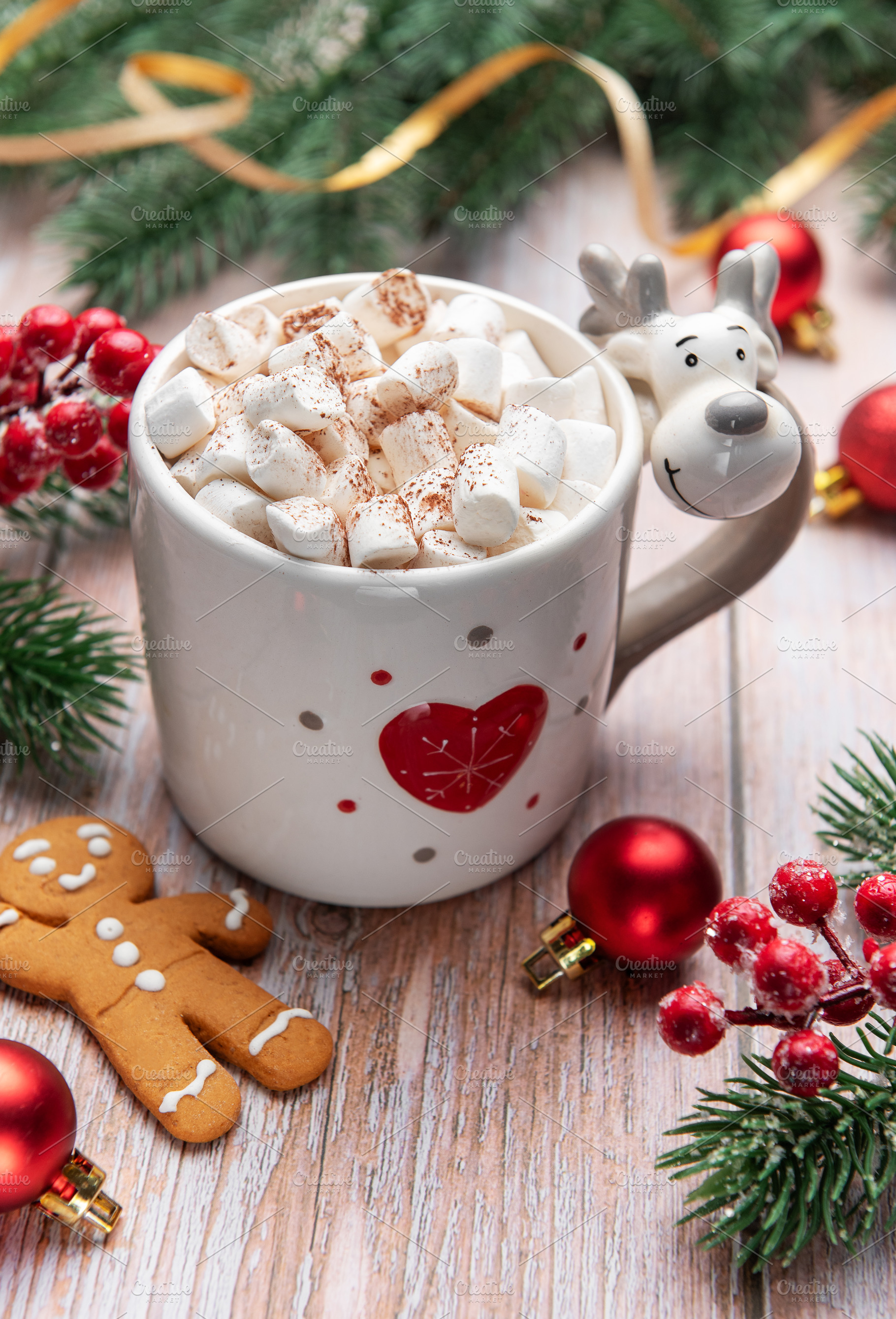 Reindeer mug with hot chocolate and marshmallows for christmas, a Holiday Photo by Olena Rudo