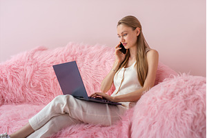 Woman managing remote work tasks, a Person Photo by undrey