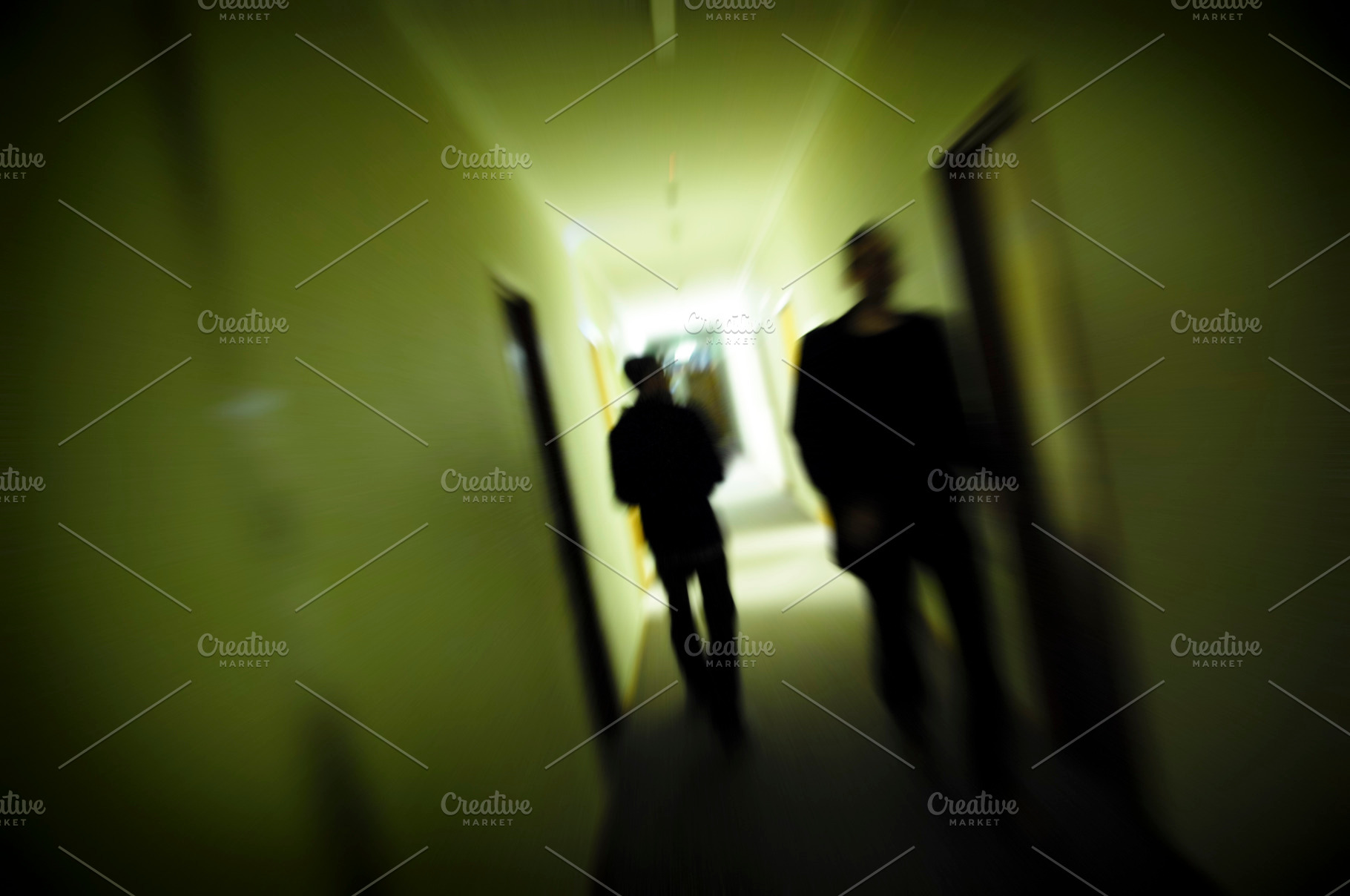 People Blurred Walking In Corridor, a Person Photo by THP Creative