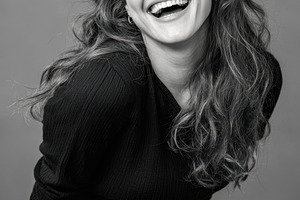Joyful Woman Laughing in Black and White Portrait, a Person Photo by AlyaAnd